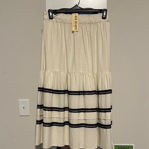 Chic Cream Midi Skirt with Black Accents